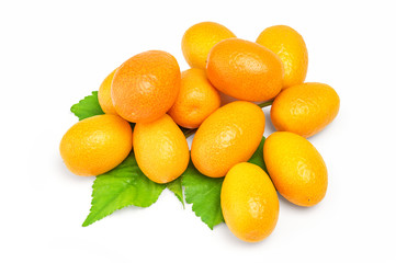 Kumquat with leaf on a white background