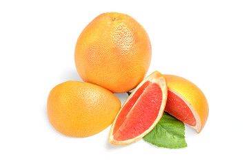 Grapefruit with wedges on white background