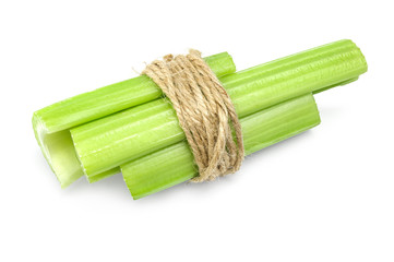 fresh celery stems on a white background cutout