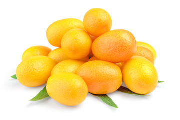 Pile of delicious and juicy kumquat fruit on a white background