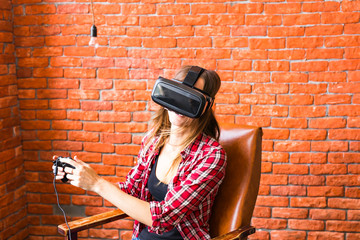 Woman in virtual reality glasses playing the game