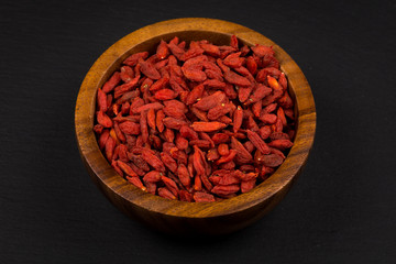 wooden bowl with goji berries