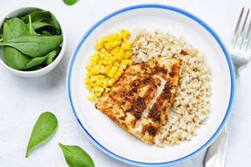 spices Cod with brown rice, spinach and corn