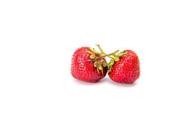 Ripe red strawberries on a white background