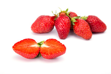 Ripe red strawberries on a white background