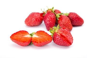 Ripe red strawberries on a white background
