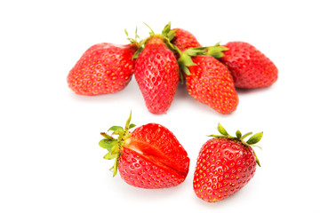 Ripe red strawberries on a white background