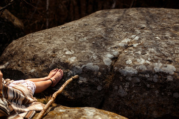 legs shaman boho woman on rocks