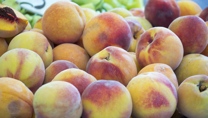 Fresh Organic Peaches Heap Of Fresh Ripe Peaches At A Market.