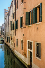 Fototapeta na wymiar Canal with beautiful medieval facades. Venice, Italy.