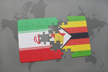 puzzle with the national flag of iran and zimbabwe on a world map background.