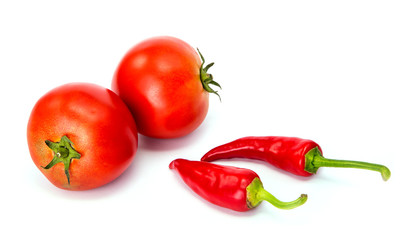  tomatoes and hot peppers white background