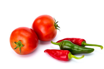  tomatoes and hot peppers white background