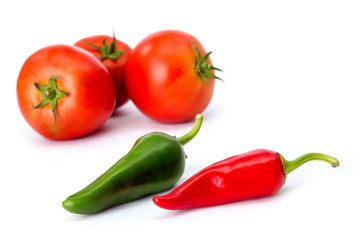 tomatoes and hot peppers white background