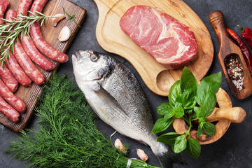 Sausages, fish and meat cooking