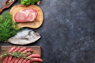 Sausages, fish and meat cooking