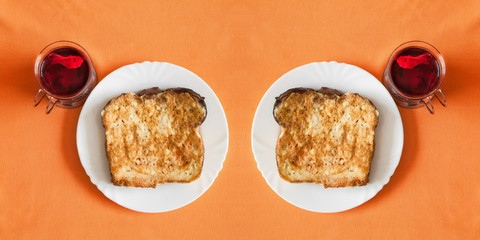 Red tea and baked bread fried eggs. Breakfast.