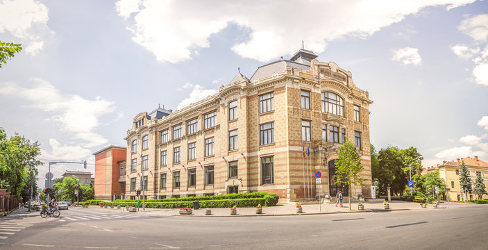 Lucian Blaga Central University Library in this beautiful Transylvanian City in Romania build in art nouveau or wiener secession architectural style with soft filters applied for a warm bright look
