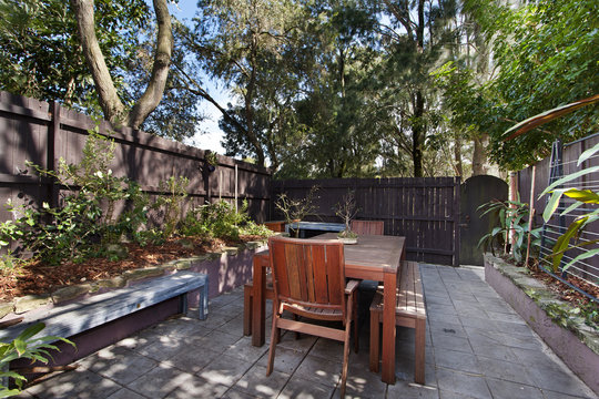 back yard with outdoor seating and barbecue with family
