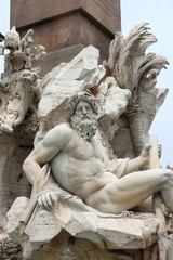 One of the marble fountains located in Navona Square of Rome, Italy