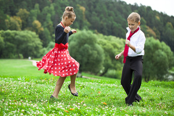 Childrens retro dance couple in suits