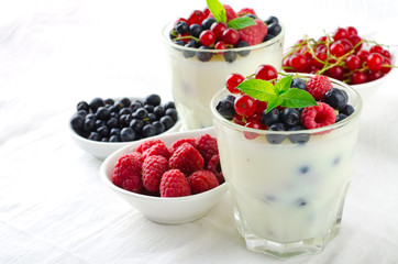 Sweet dessert, pudding, panna cotta with mix berries and mint