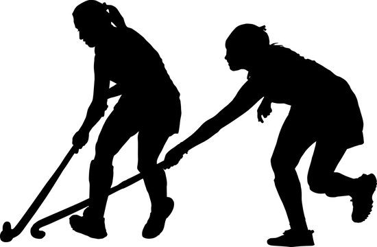 Silhouette of girl ladies hockey players battling for possession