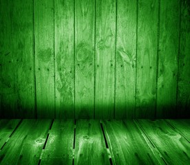 Wooden interior with colorful wall and floor.