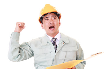 ガッツポーズの労働者