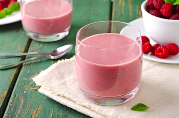 Healthy berry with raspberry, oatmeal and mint in a glass