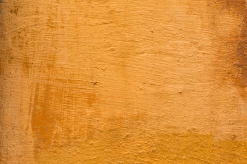 background texture of a terra cotta colored wall