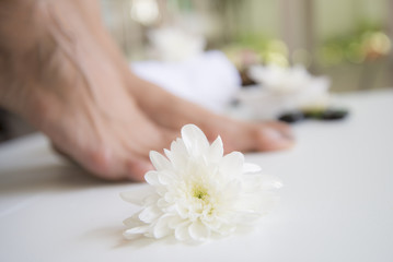 Obraz na płótnie Canvas Spa treatment and product for female feet spa, Thailand. Select and soft focus 