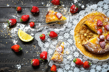 Lemon cake with strawberries, sugar end chocolate