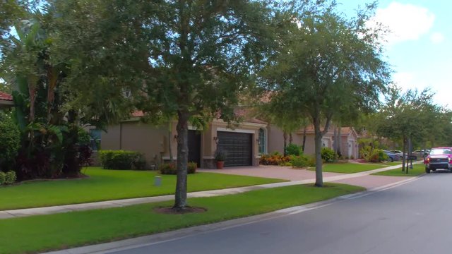 Motion footage of an upscale neighborhood in West Palm Florida