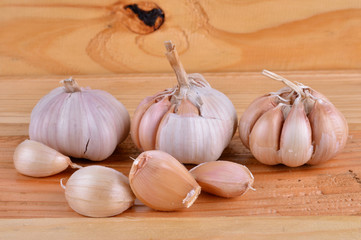  garlic on the wooden background