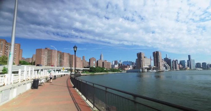 A rider's perspective on the East River Bikeway near Stuyvesant Town with the Empire State Building in the distance.  	
