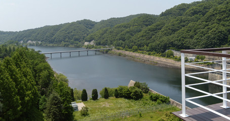 View of reservoir from top of a hill at a country park near the power station and dam