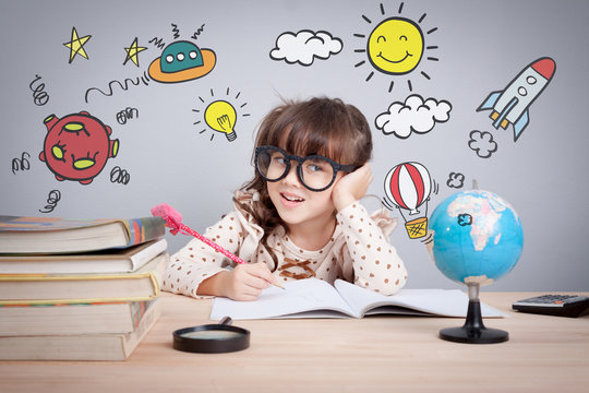 education concept , cute little girl at school happy to making homework with creativity
