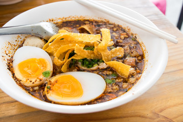 Rice noodles with spicy pork sauce
