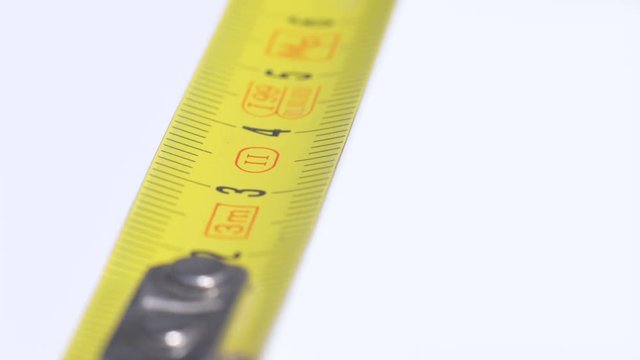 measuring tape close up dolly shot