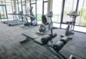 Fototapeta na wymiar Abstract blur fitness room interior for background