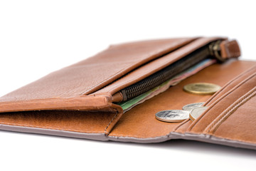 Thai coins in brown leather wallet on white background