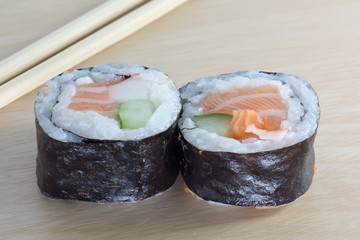 Sushi on the wood table. Sushi is a type of food preparation originating in Japan.
