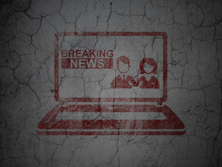 News concept: Breaking News On Laptop on grunge wall background