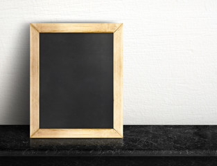 Blank blackboard on black marble table at white tile wall,Templa