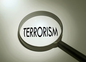 Magnifying glass with the word terrorism