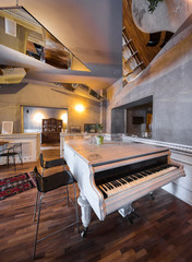 white piano in restaourant interior
