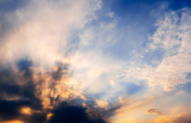 yellow blue sky with rays of light