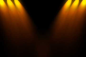 Naklejka premium dark space with gold spotlight background