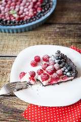 Homemade tart pie with cream, raspberry and black currants